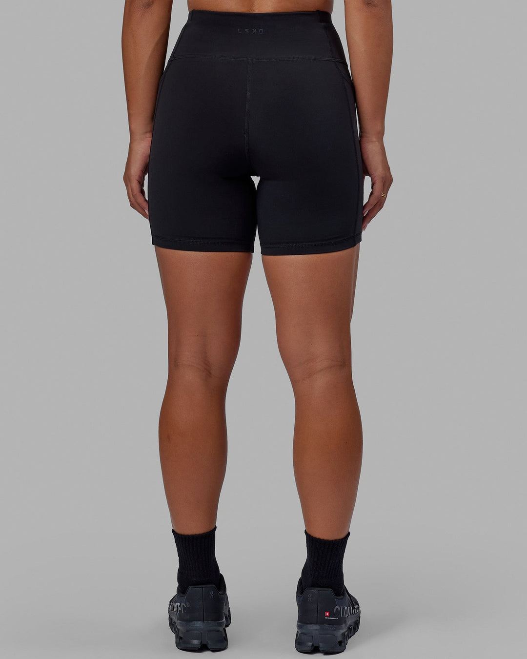 Woman wearing Rep Mid Short Tight - Black-White