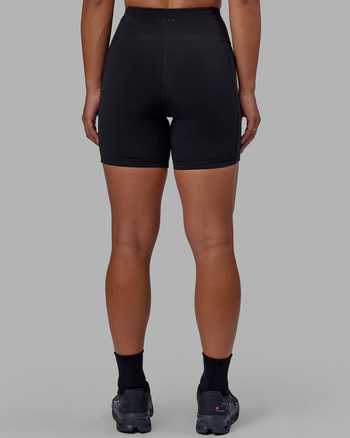 Woman wearing Rep Mid Short Tight - Black-White