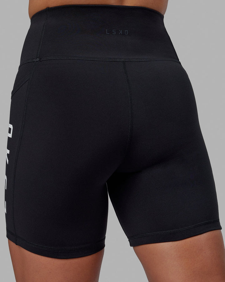 Woman wearing Rep Mid Short Tight - Black-White