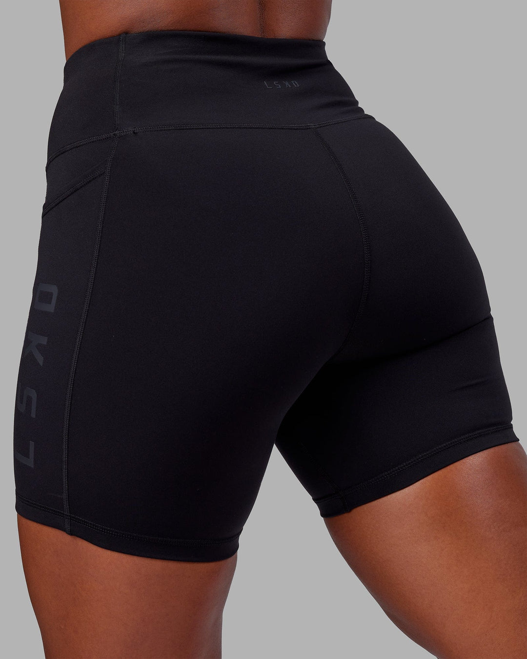 Woman wearing Rep Ultra High-Rise 6&quot; Short Pockets - Black-Black | Model:Sierra | Size:L