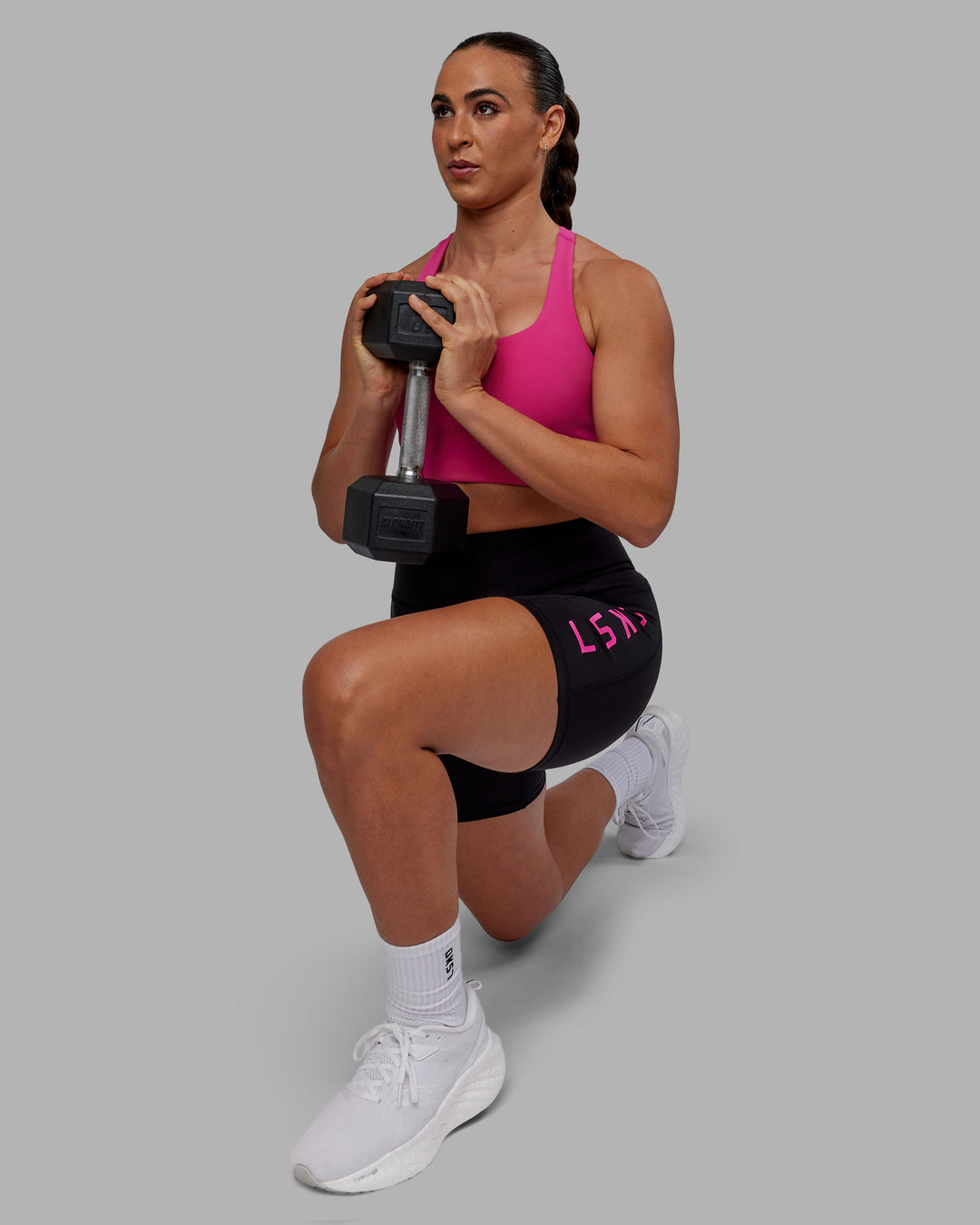 Woman wearing Rep Ultra High-Rise 6&quot; Short Pockets - Black-Fuchsia Pink | Model:Sophie | Size:S