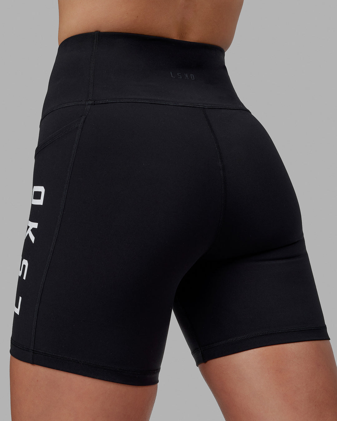 Woman wearing Rep Ultra High-Rise 6&quot; Short Pockets - Black-White | Model:Shae | Size:S