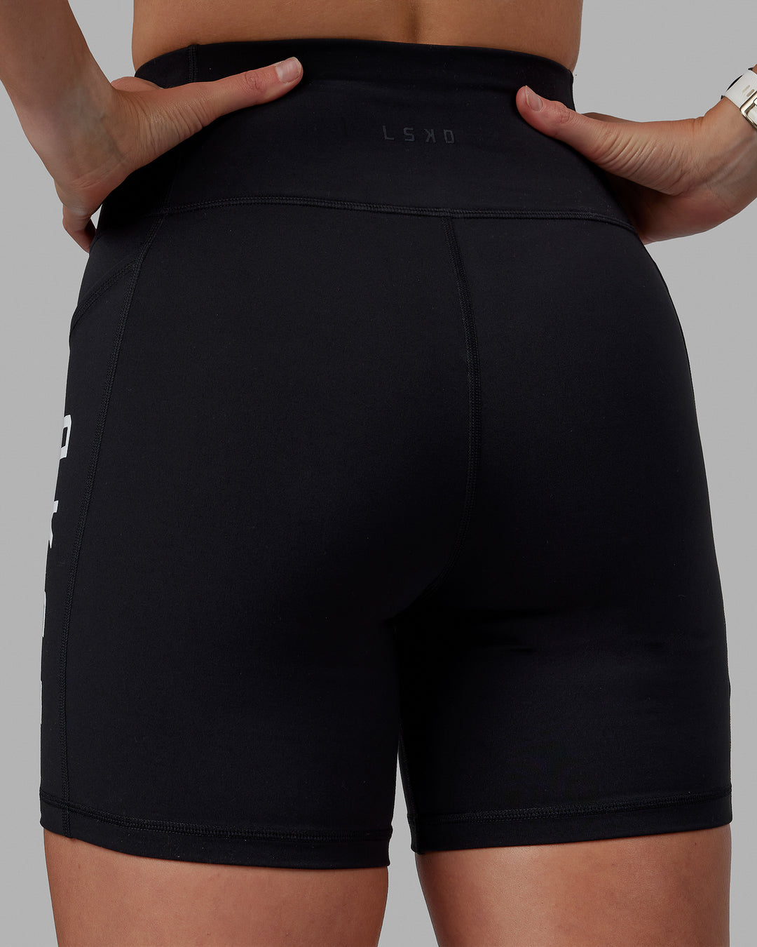 Woman wearing Rep Ultra High-Rise 6&quot; Short Pockets - Black-White | Model:Shae | Size:S