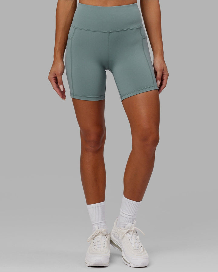 Woman wearing Rep Mid Short Tight Small Logo - Eclipse
