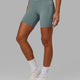 Woman wearing Rep Mid Short Tight Small Logo - Eclipse