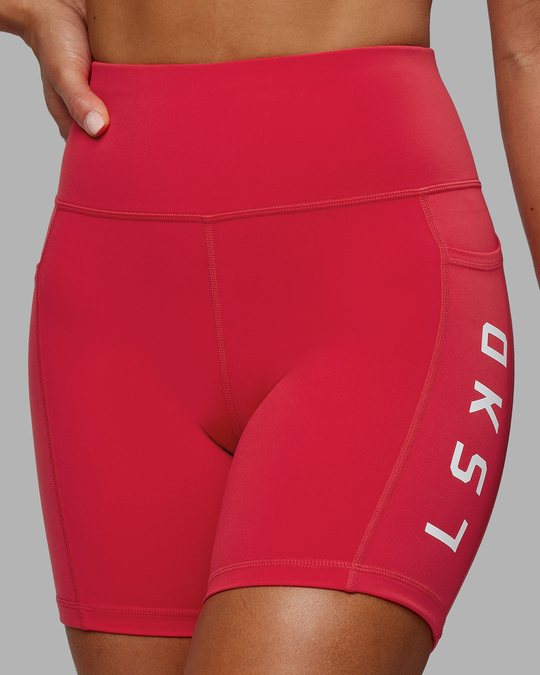 Woman wearing Rep Ultra High-Rise 6&quot; Short Pockets - Scarlet-White | Model:Demi | Size:S