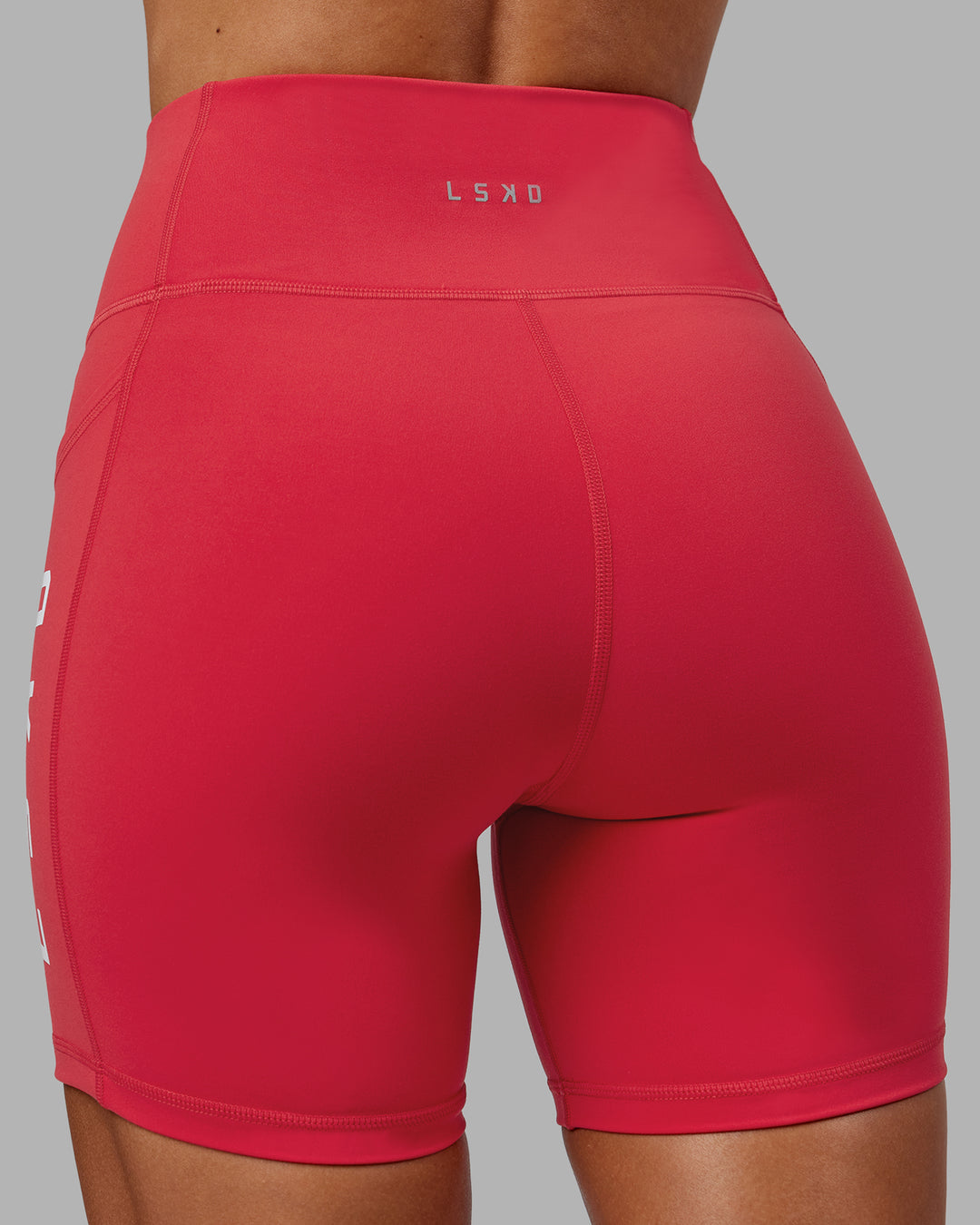 Woman wearing Rep Ultra High-Rise 6&quot; Short Pockets - Scarlet-White | Model:Demi | Size:S