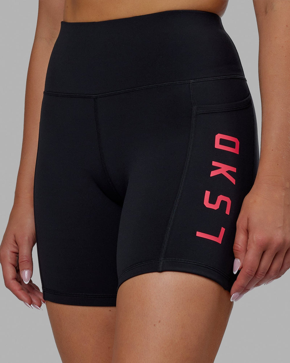 Woman wearing Rep Mid Short Tights - Black-Raspberry