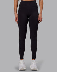 Woman wearing Rep Ultra High-Rise Tall Legging Pockets - Black-Black | Model:Hannah | Size:S