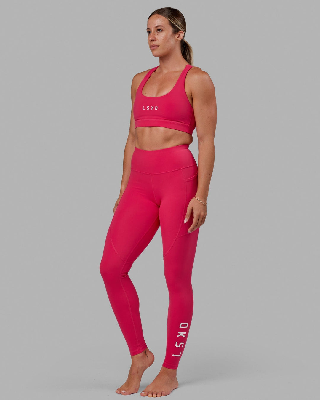 Woman wearing Rep Ultra High-Rise Tall Legging Pockets - Boysenberry | Model:Bree | Size:S