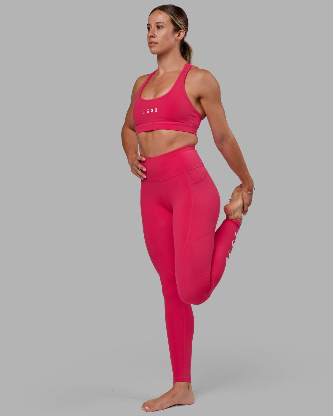 Woman wearing Rep Ultra High-Rise Tall Legging Pockets - Boysenberry | Model:Bree | Size:S