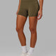 Woman wearing Rep X-Short Tight - Army Green