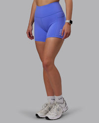 Woman wearing Rep Ultra High-Rise 4" Short Pockets - Baja Blue-White | Model:Lillie | Size:S