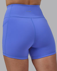 Woman wearing Rep Ultra High-Rise 4" Short Pockets - Baja Blue-White | Model:Lillie | Size:S