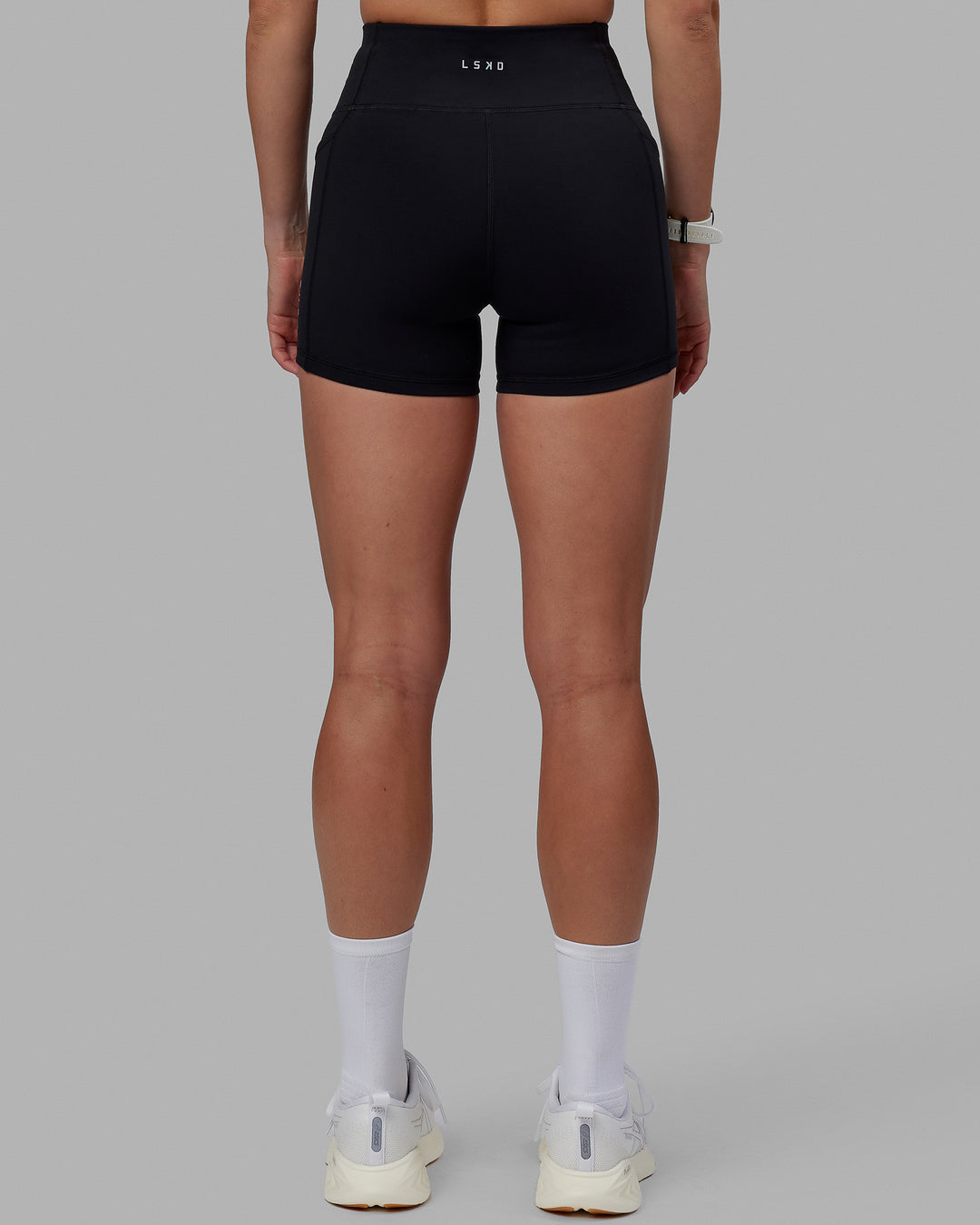 Women wearing O.G. Rep Ultra High-Rise 4&quot; Short Pockets - Black-White | Model:Shae | Size:S