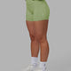 Woman wearing Rep X-Short Tights - Green Fig