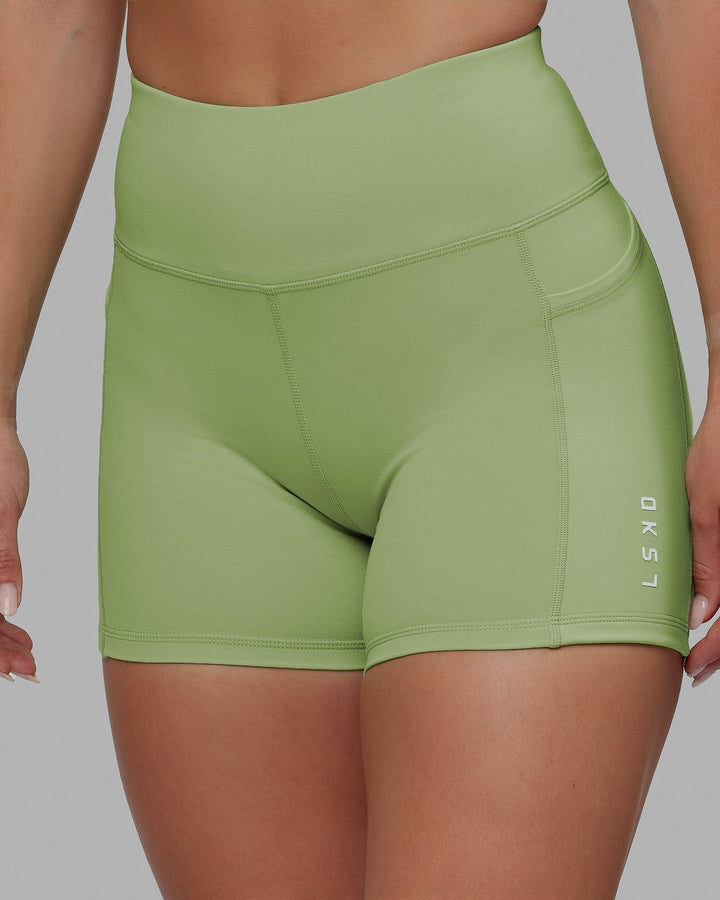 Woman wearing Rep X-Short Tights - Green Fig
