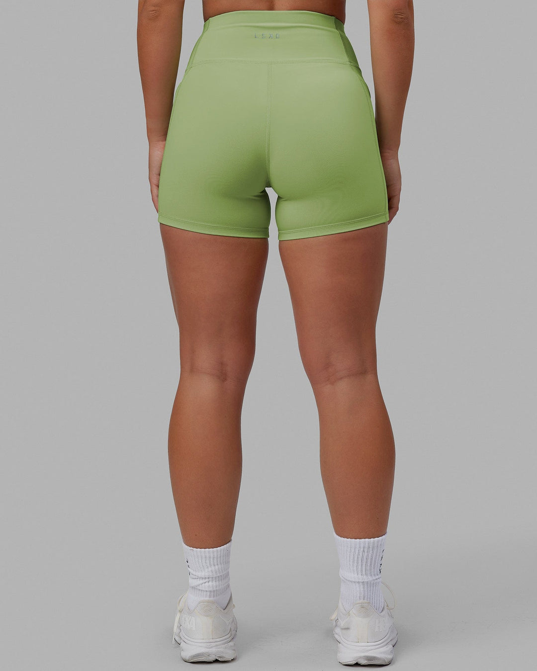 Woman wearing Rep X-Short Tights - Green Fig