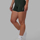 Woman wearing Rep X-Short Tights - Vital Green