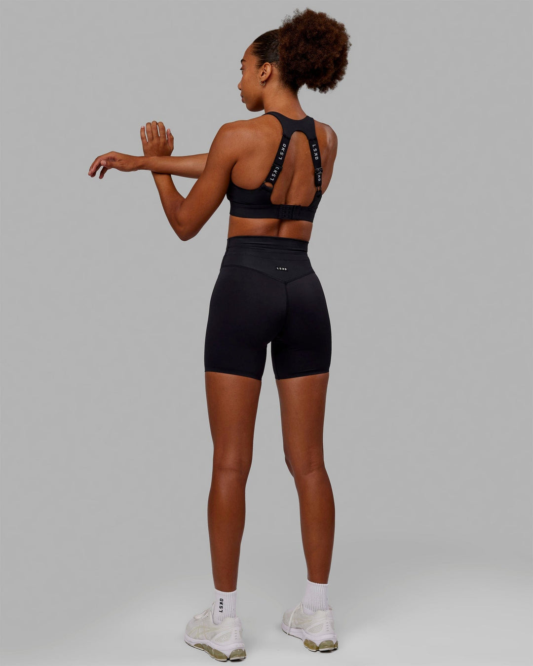 Woman wearing Resistance Ultra High-Rise 6" Short - Black