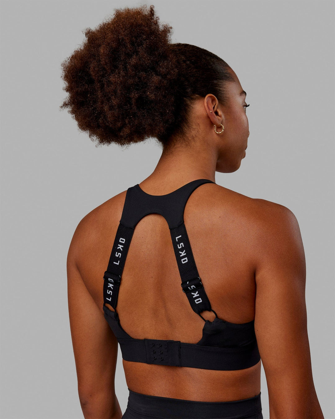 Woman wearing Resistance Ribbed Sports Bra - Black