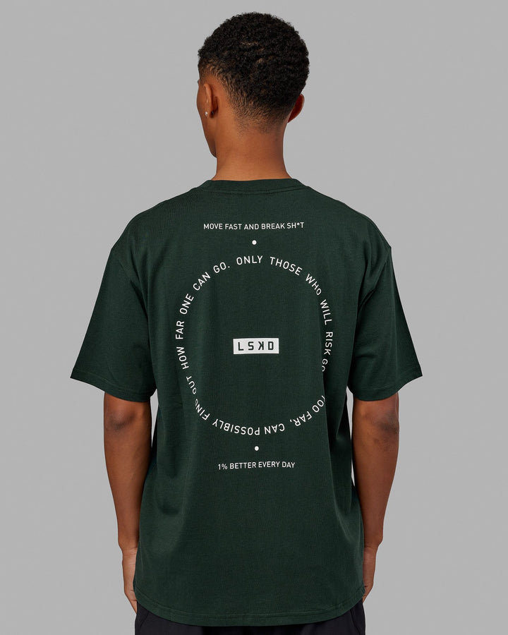 Man wearing Unisex Rotate Tee Oversize - Vital Green-White