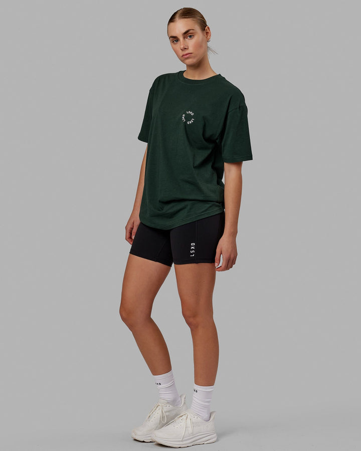 Woman wearing Unisex Rotate Tee Oversize - Vital Green-White
