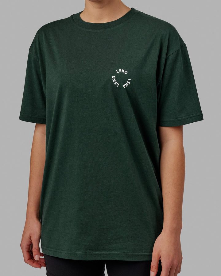 Woman wearing Unisex Rotate Tee Oversize - Vital Green-White