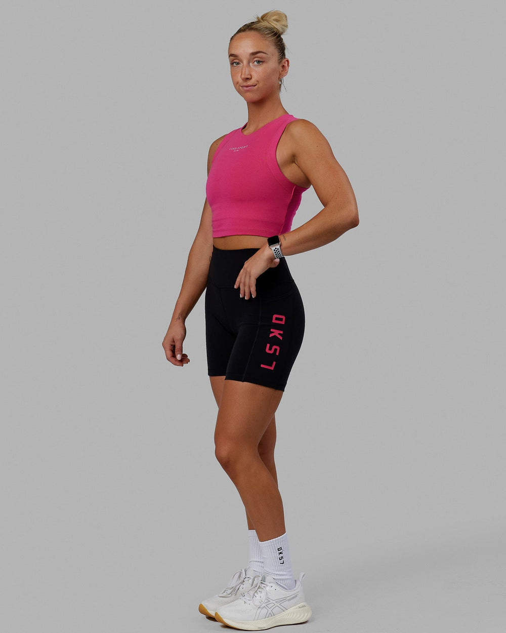 Woman wearing Run Tank - Magenta-White