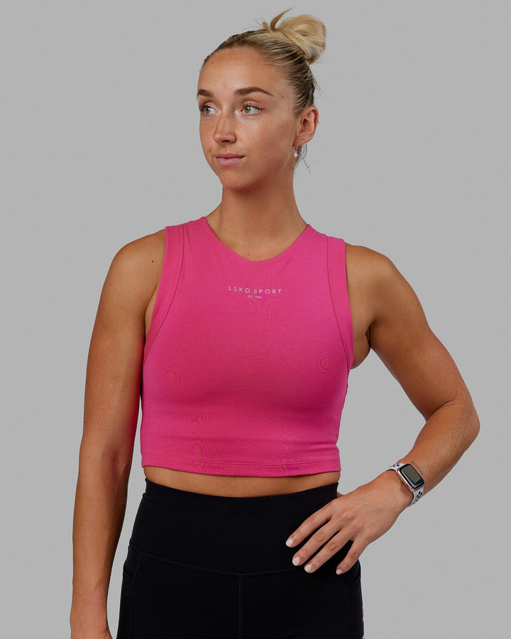 Woman wearing Run Tank - Magenta-White