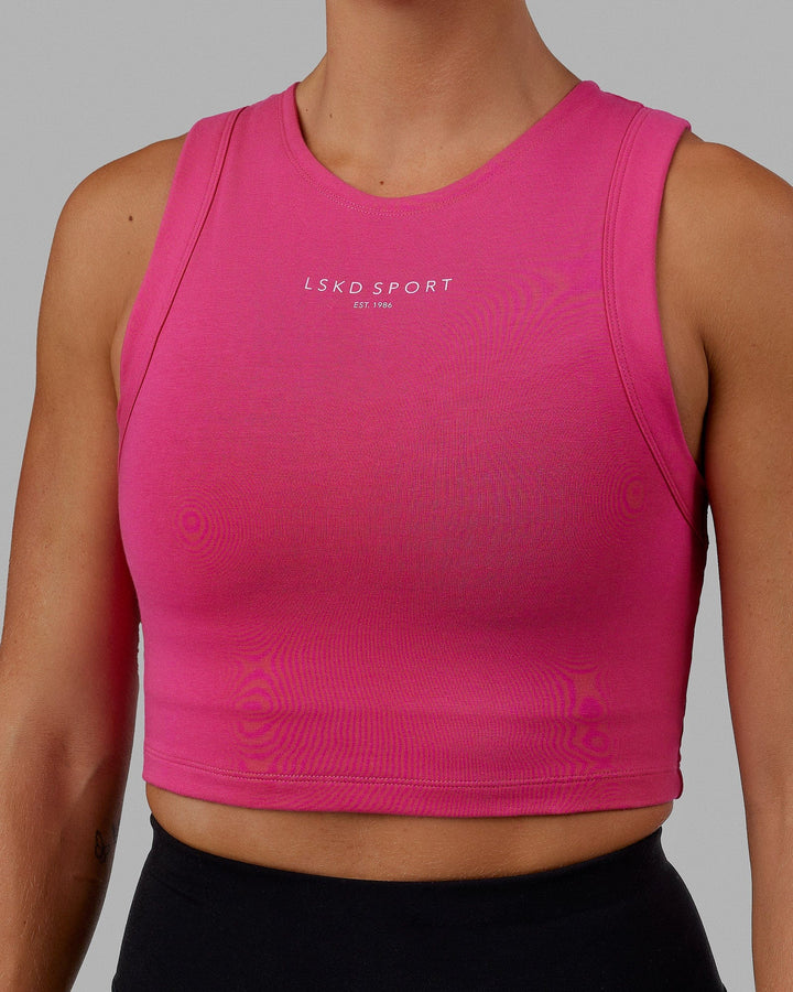 Woman wearing Run Tank - Magenta-White