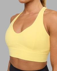 Woman wearing Sculpt Sports Bra - Lemon