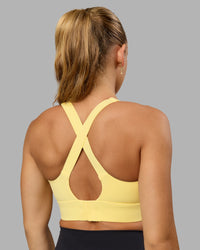 Woman wearing Sculpt Sports Bra - Lemon