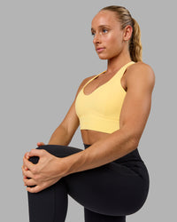 Woman wearing Sculpt Sports Bra - Lemon