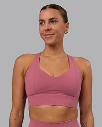 Woman wearing Sculpt Sports Bra - Mauve Haze