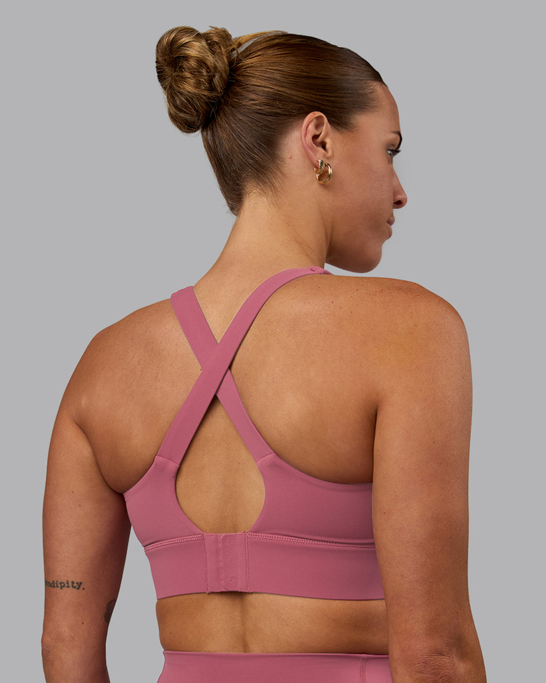 Woman wearing Sculpt Sports Bra - Mauve Haze