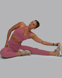 Woman wearing Sculpt Sports Bra - Mauve Haze