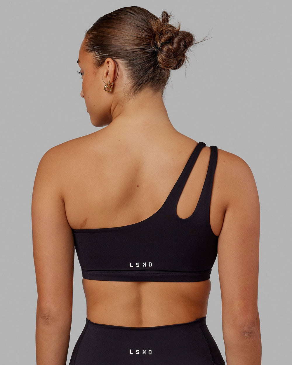 Woman wearing Set Up Sports Bra - Black