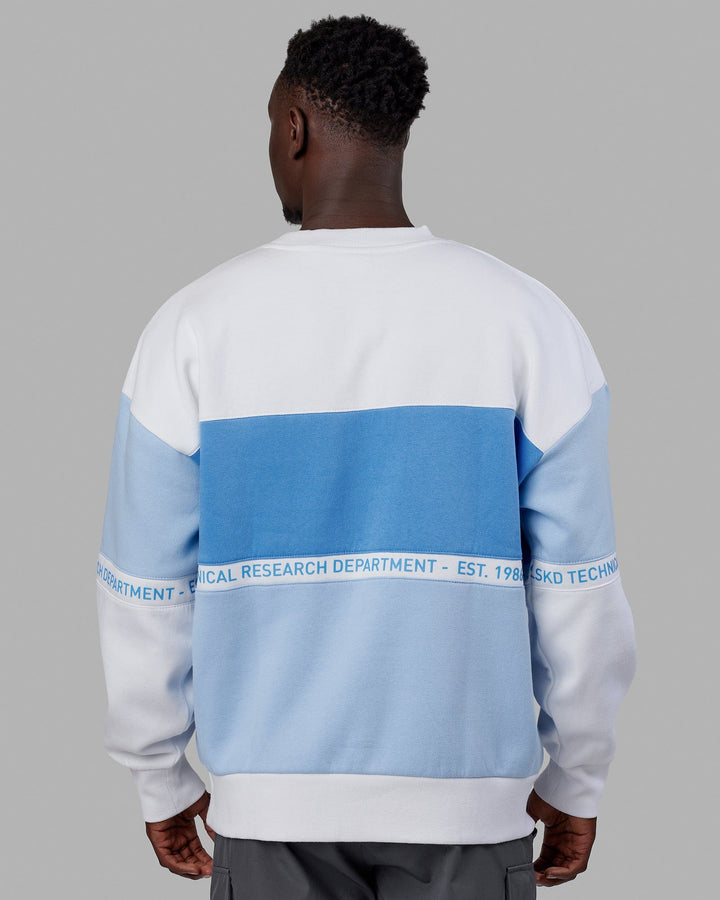 Man wearing Unisex Sportif Sweater Oversize - Windsurfer-Azure Blue