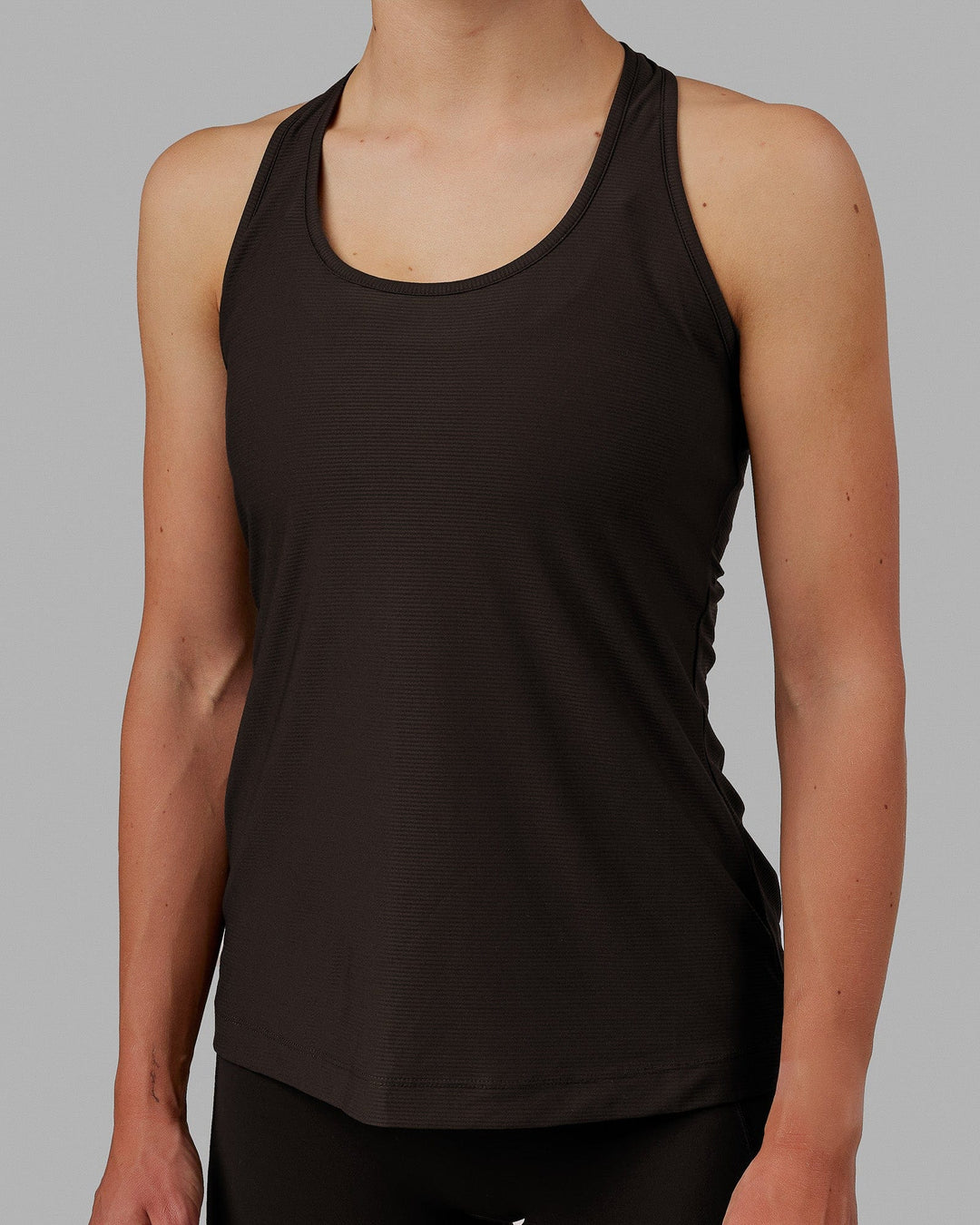 Woman wearing Sprint Tank - Dark Walnut