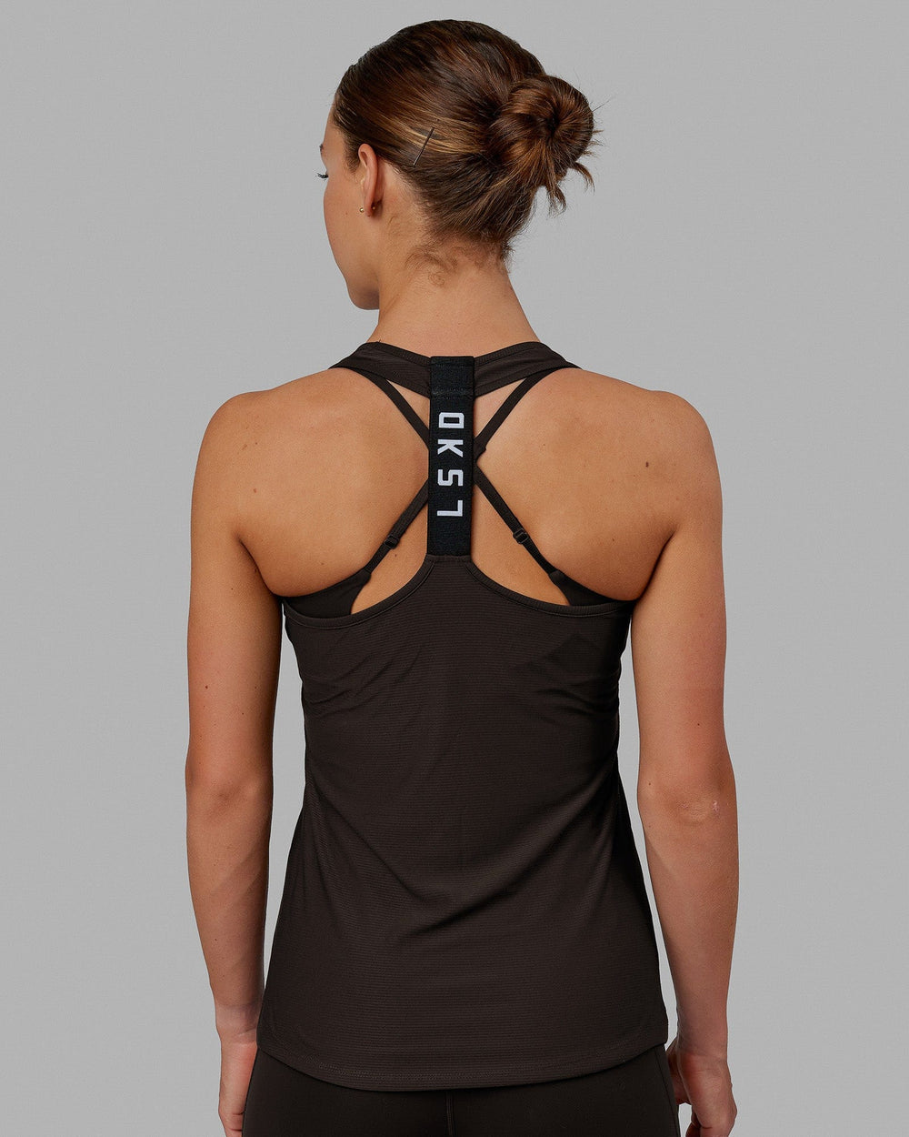 Woman wearing Sprint Tank - Dark Walnut
