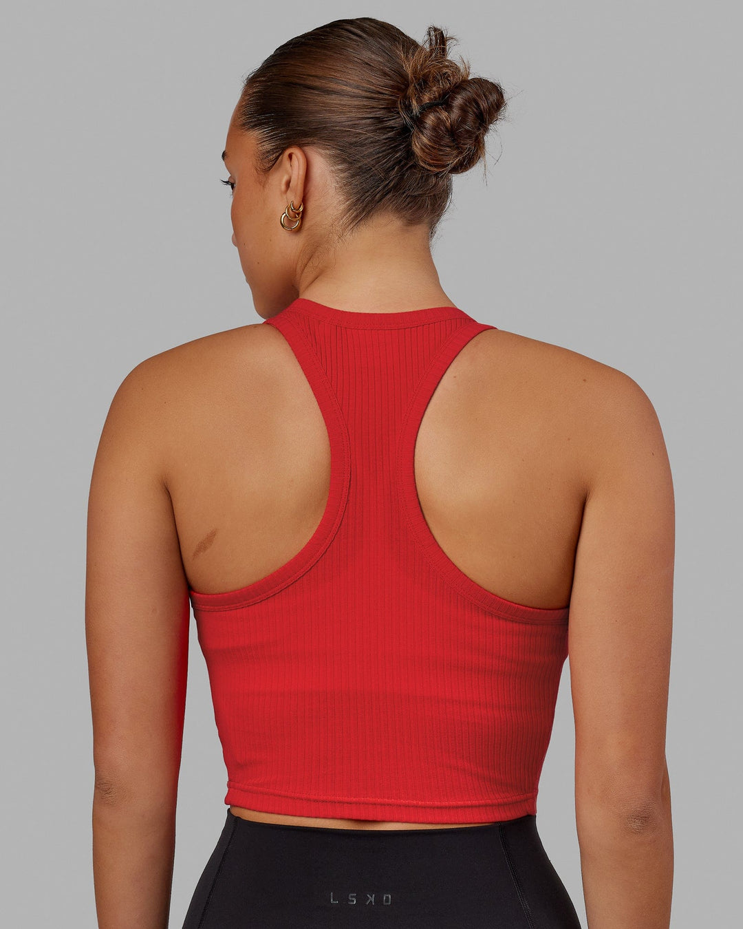 Woman wearing Squad Ribbed Tank - Infared