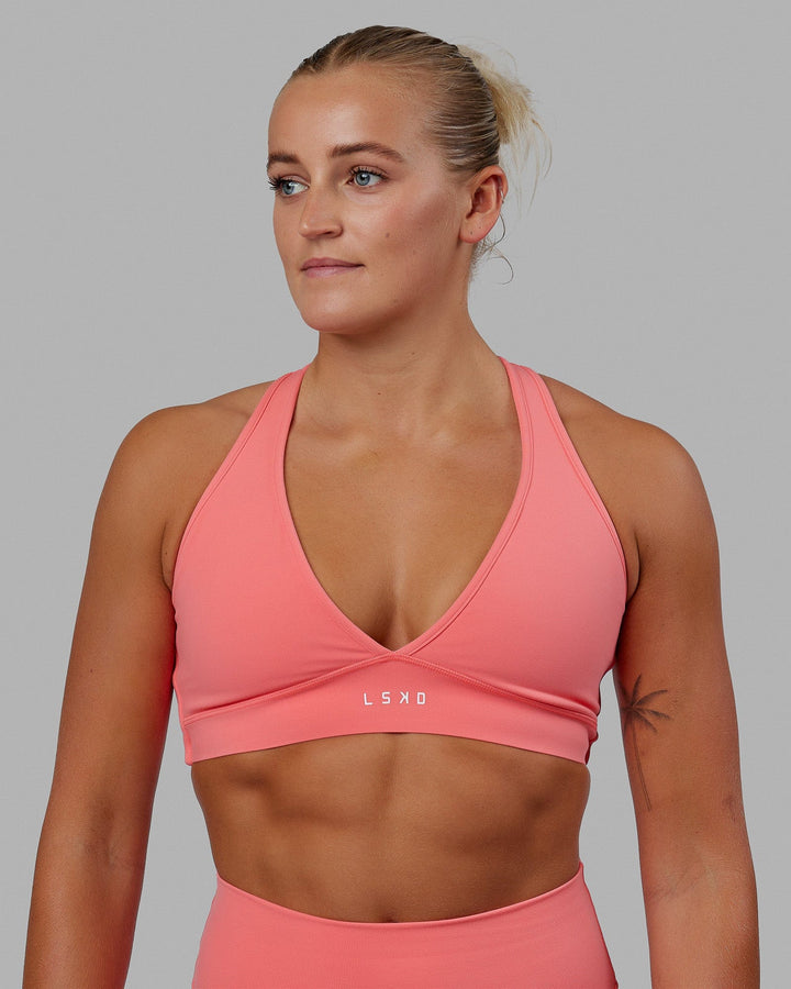 Woman wearing Stamina Bra - Coral