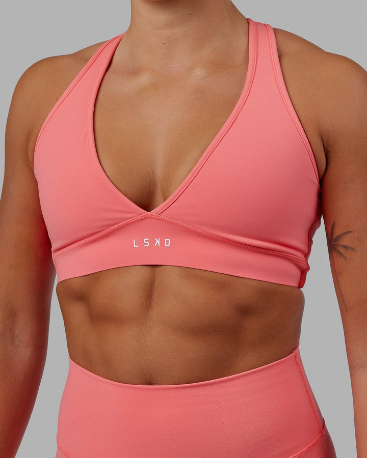 Woman wearing Stamina Bra - Coral