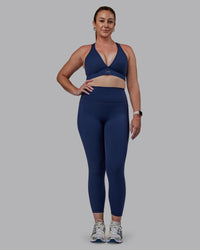 Woman wearing Stamina Sports Bra -(D/DD/E) - Future Navy | Model:Tegan | Size:M