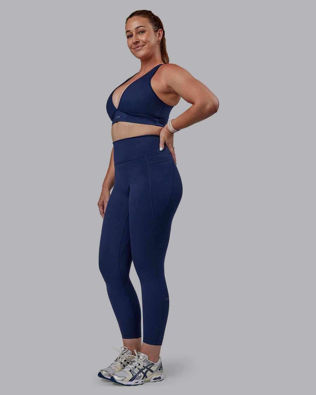 Woman wearing Stamina Sports Bra -(D/DD/E) - Future Navy | Model:Tegan | Size:M