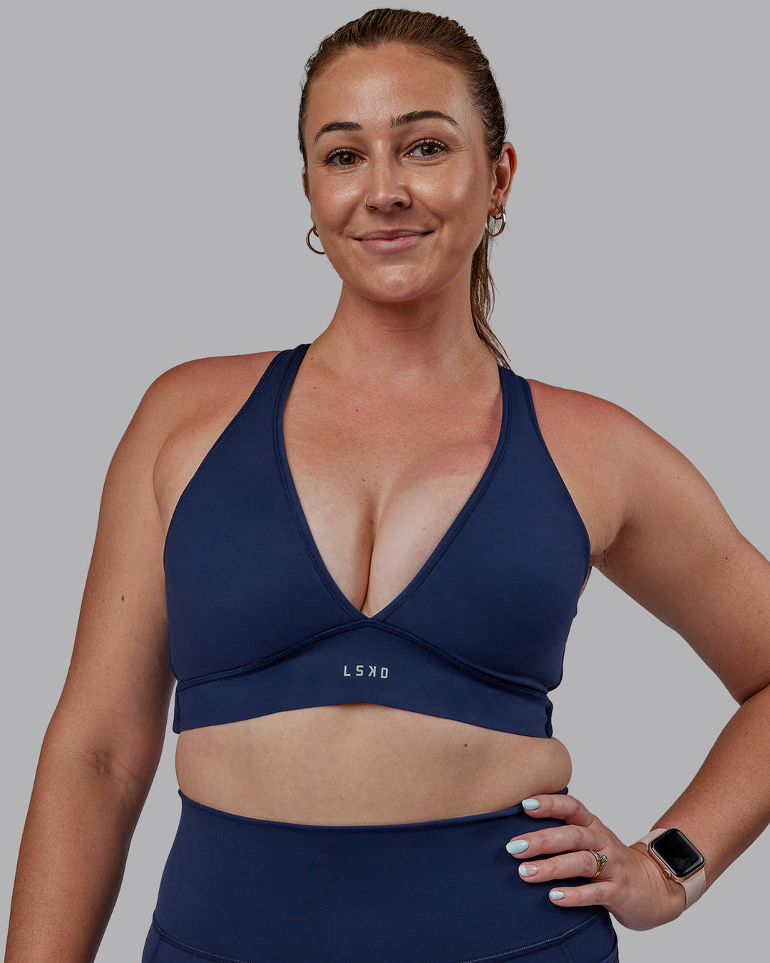 Woman wearing Stamina Sports Bra -(D/DD/E) - Future Navy | Model:Tegan | Size:M