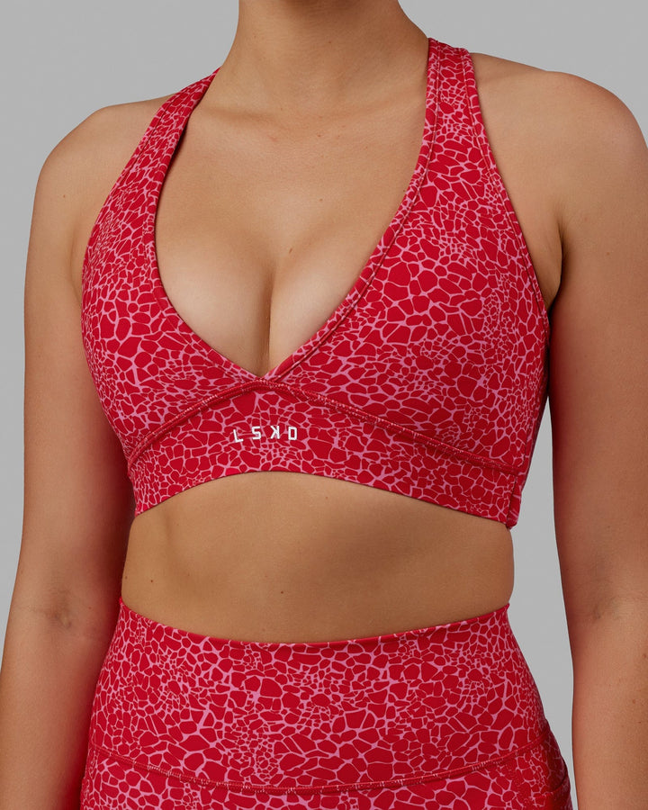 Woman wearing Stamina Sports Bra - Pink Vitality