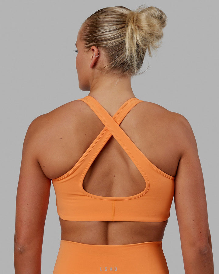 Woman wearing Stamina Bra - Tangerine