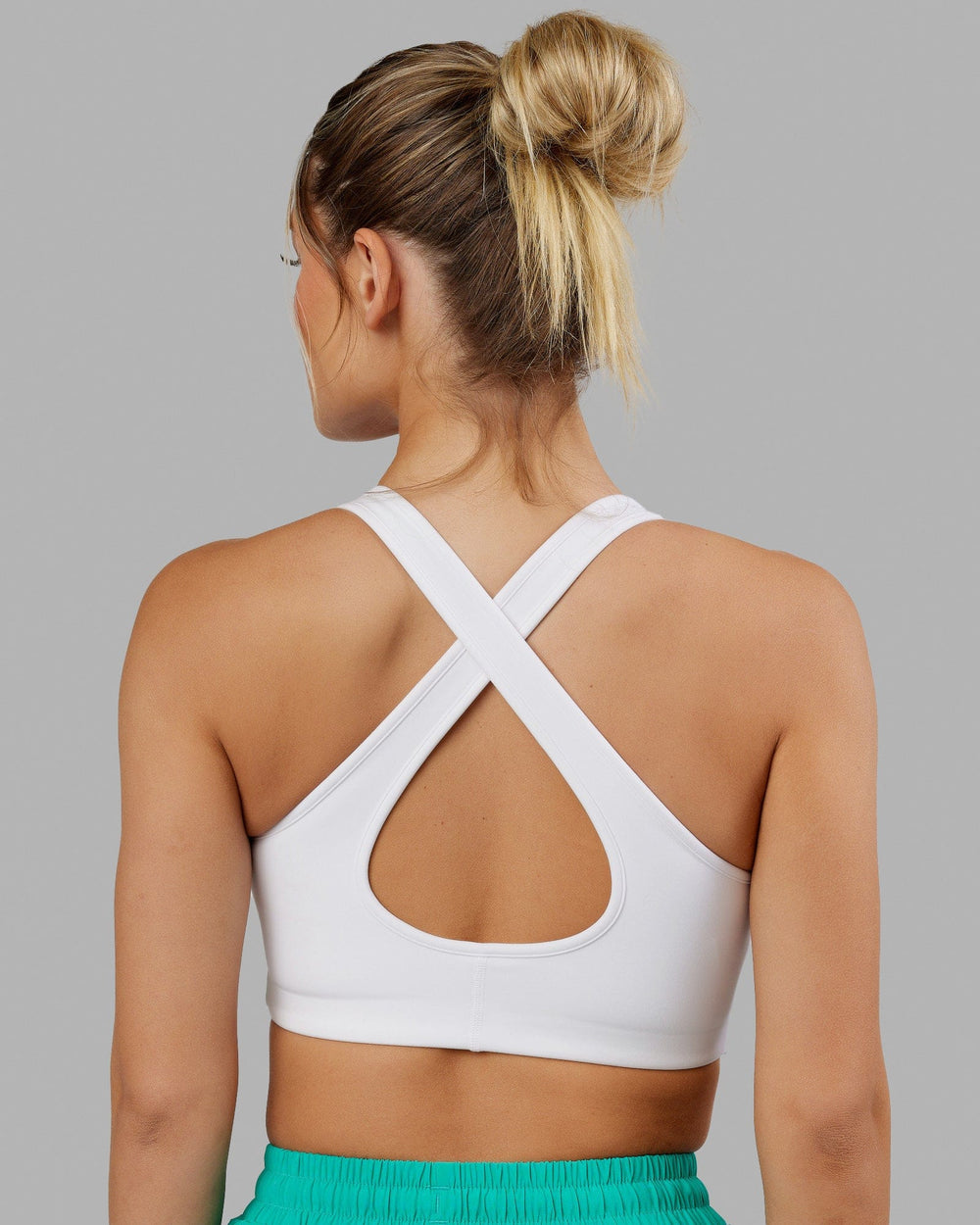 Woman wearing Stamina Sports Bra - White